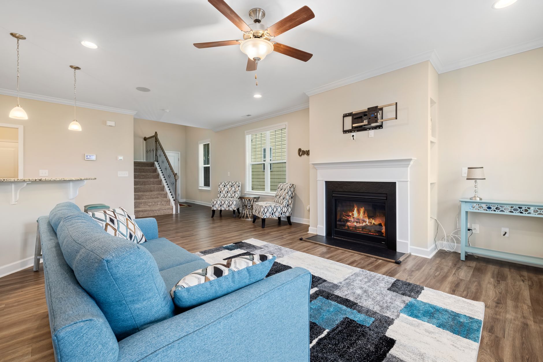 Wood-look plank flooring in an Ohio living room with a fireplace