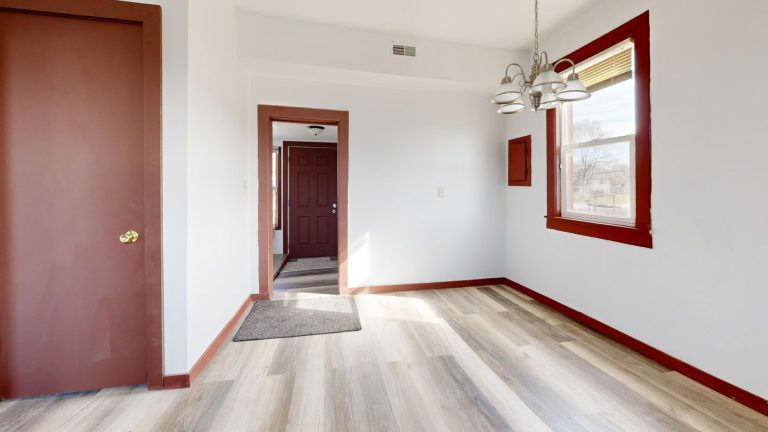 Grey vinyl plank flooring in an empty Ohio room before furniture